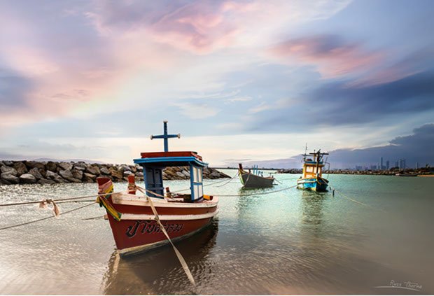 Thai Fishing boats in Thailand, sunset, Photo by Russ Thorne