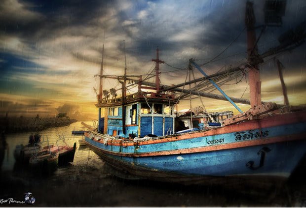 Thai Fishing boats in Thailand, sunset, Photo by Russ Thorne