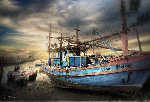 Thai Fishing boats in Thailand, sunset, Photo by Russ Thorne