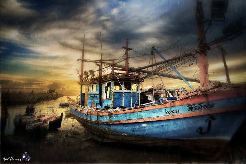 Thai Fishing boats in Thailand, sunset, Photo by Russ Thorne