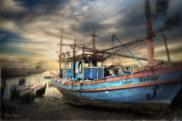 Thai Fishing boats in Thailand, sunset, Photo by Russ Thorne
