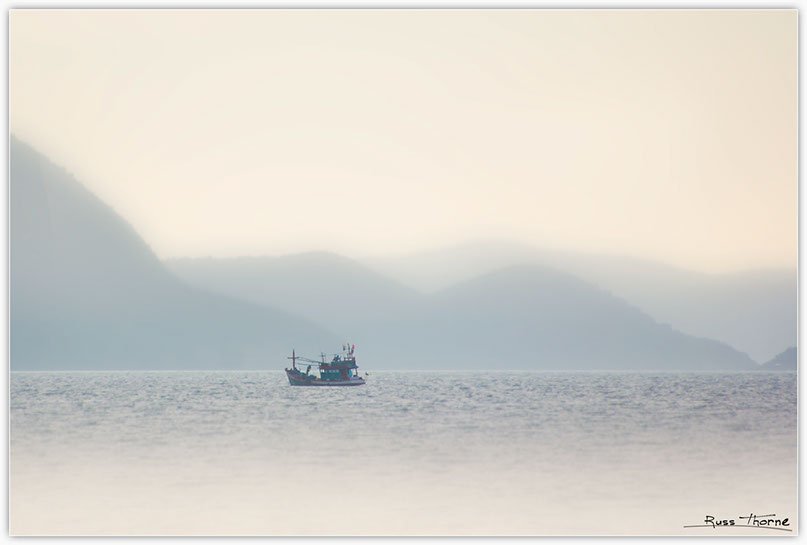 Thai Fishing boats in Thailand, sunset, Photo by Russ Thorne